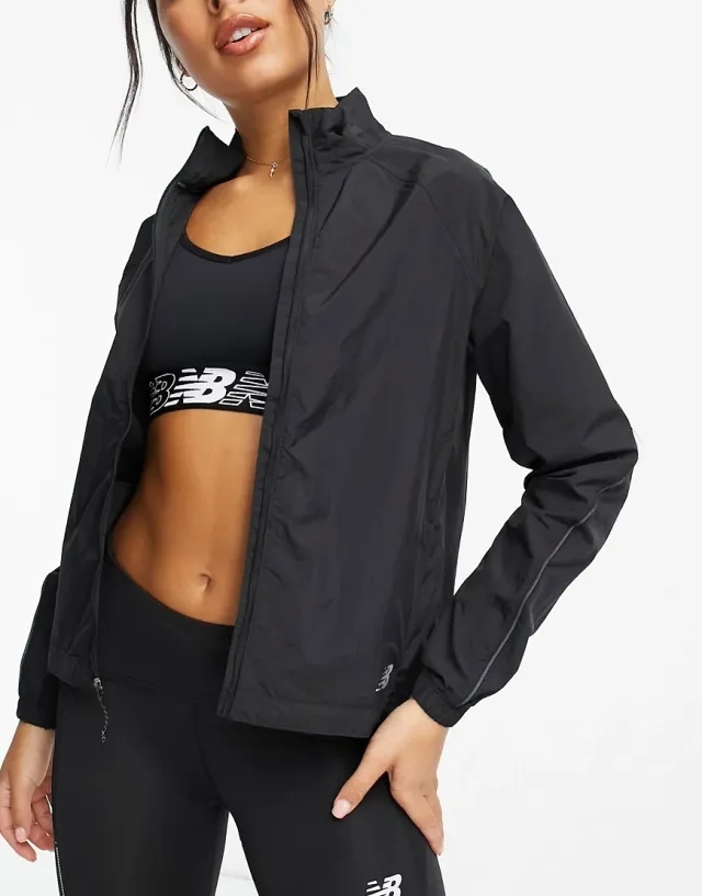 New Balance Women's Impact Run Packable Jacket in Black Polywoven