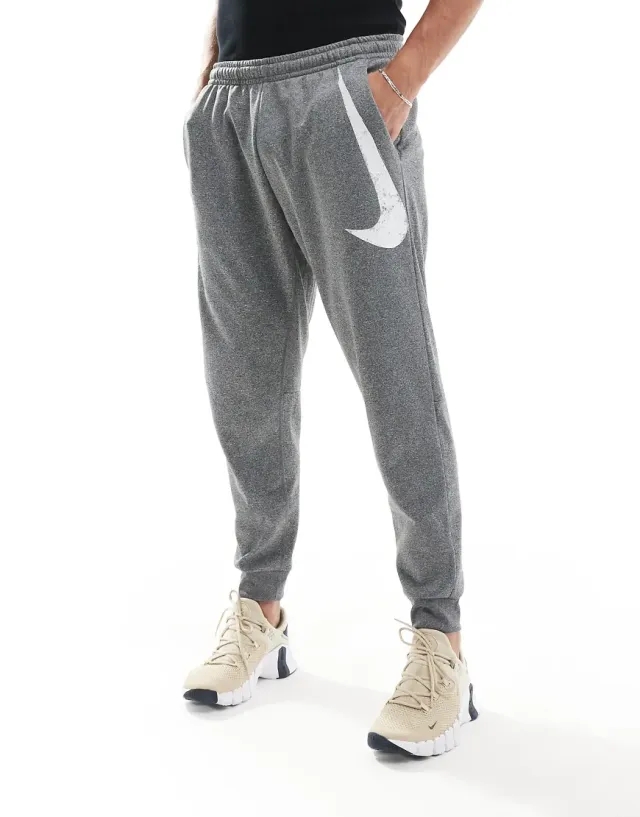 Nike Training Swoosh Graphic Tapered Joggers In Grey-Black