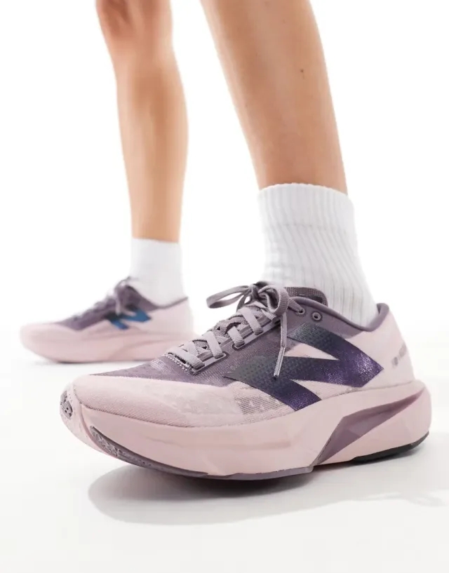 New Balance fuelcell rebel v4 trainers in pink multi