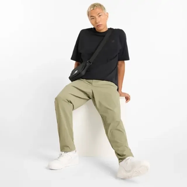 New Balance Men's Athletics Ripstop Standard Tapered Pant 30" in Green Polywoven