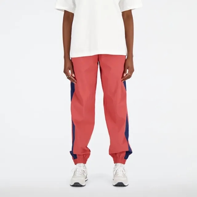 New Balance Women's Athletics Remastered Woven Pant in Red Polywoven