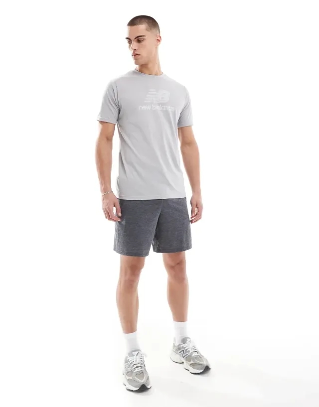 New Balance Men's Sport Essentials Heathertech Short 7" in Black Poly Knit