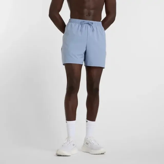 New Balance Men's Sport Essential Short 5" in Blue Polywoven