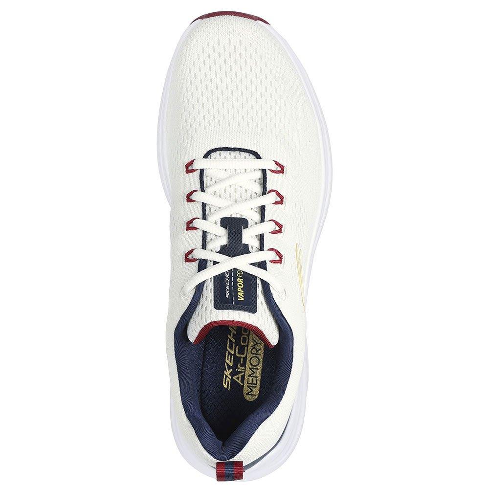 Skechers Men's Vapor Foam Sneaker in White/Navy Blue
